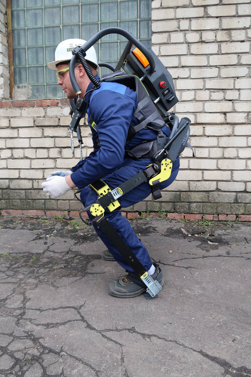 Sitting position in the exoskeleton ExoHeaver Sitting position in the exoskeleton ExoHeaver